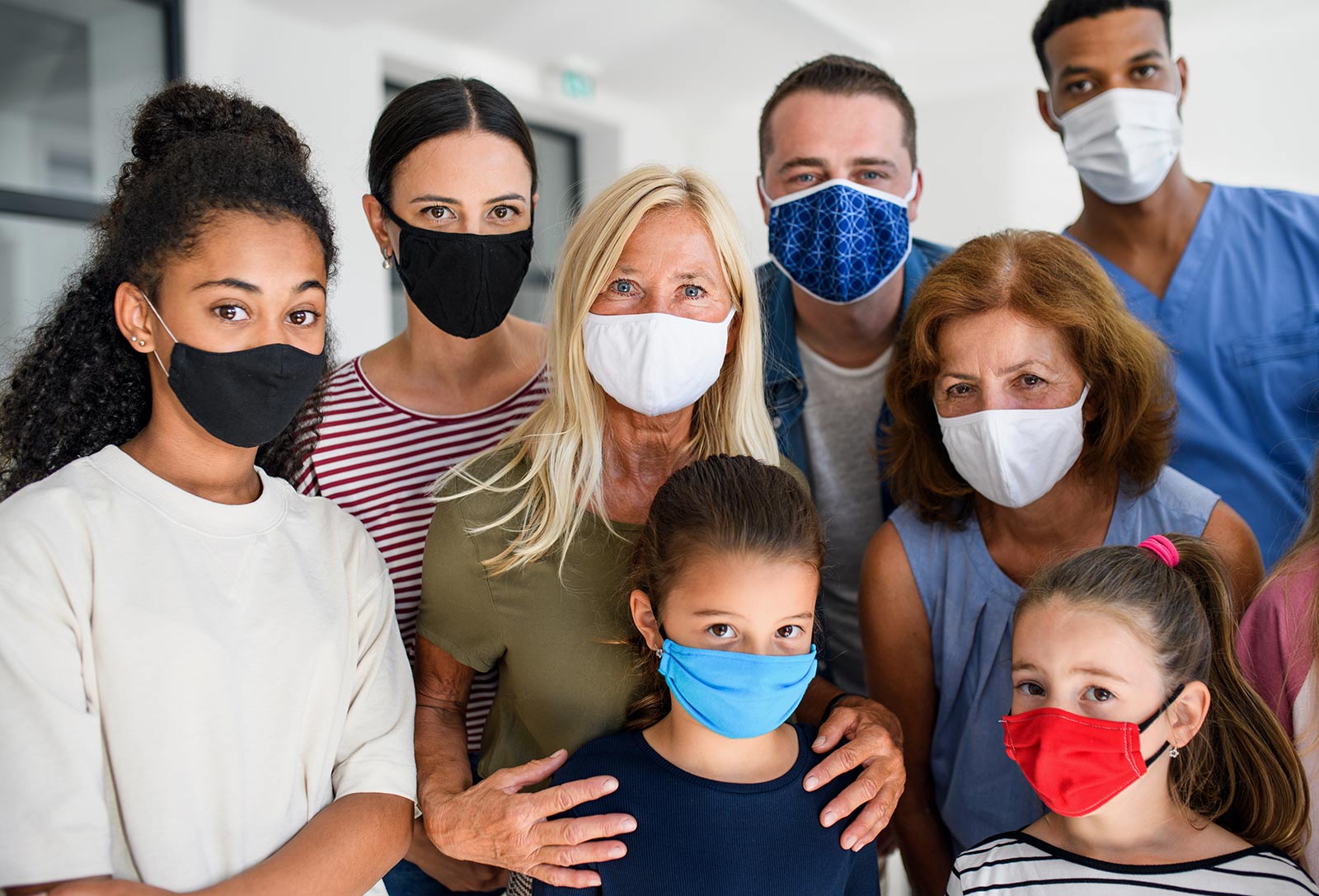 diverse people wearing masks
